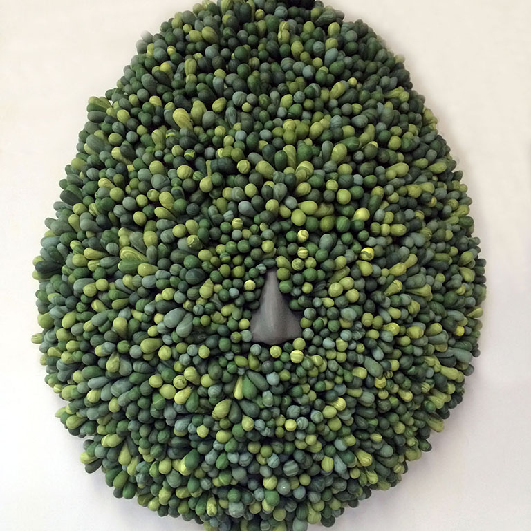 Art of a nose surround by green objects.